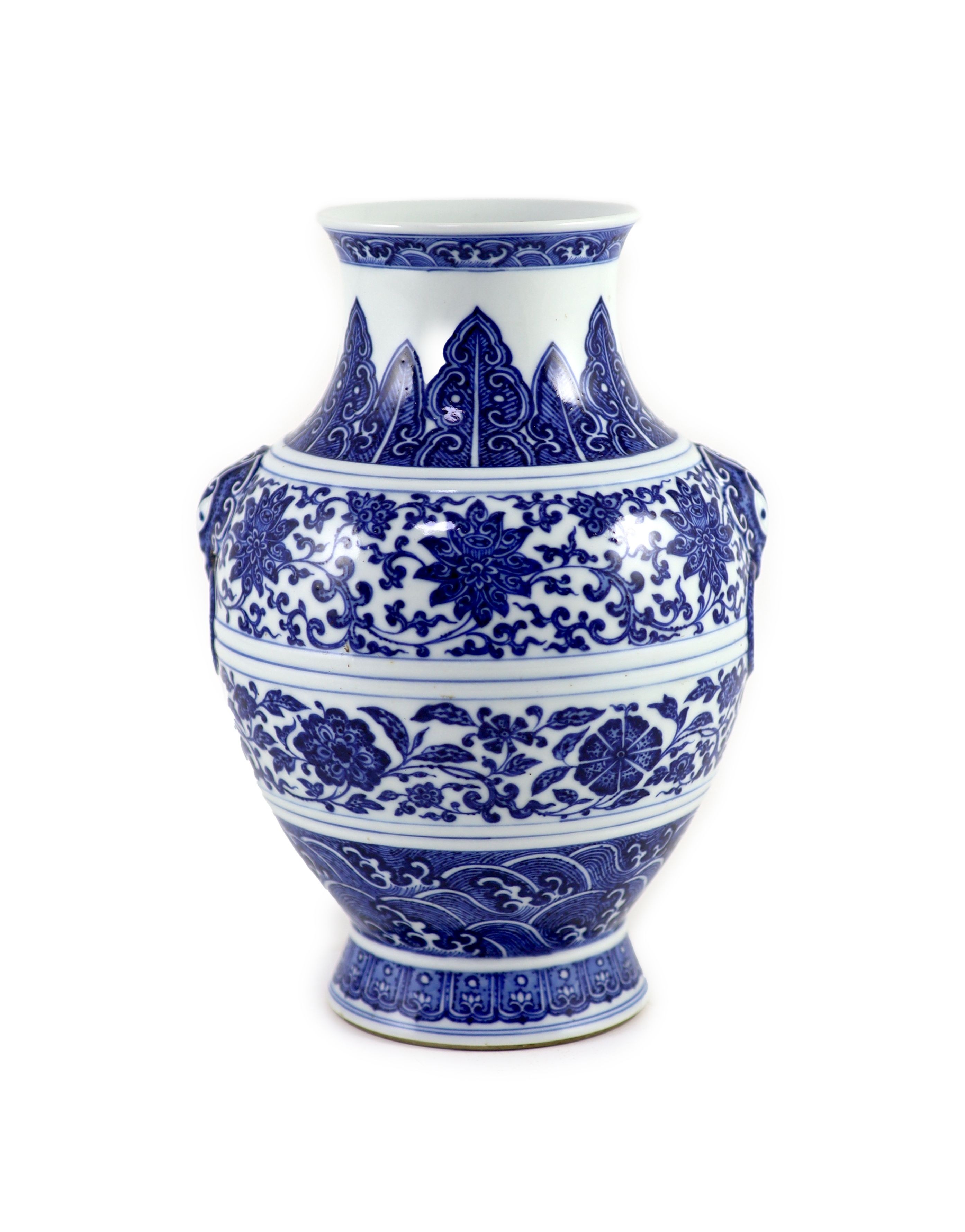 A Chinese archaistic blue and white vase, hu, Qianlong mark and possibly of the period, 25 cm high